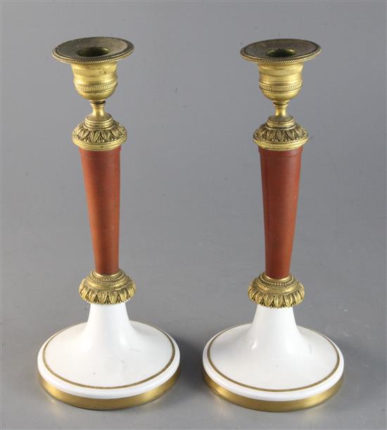 A pair of 19th century French ormolu mounted simulated porphyry candlesticks 10.75in.